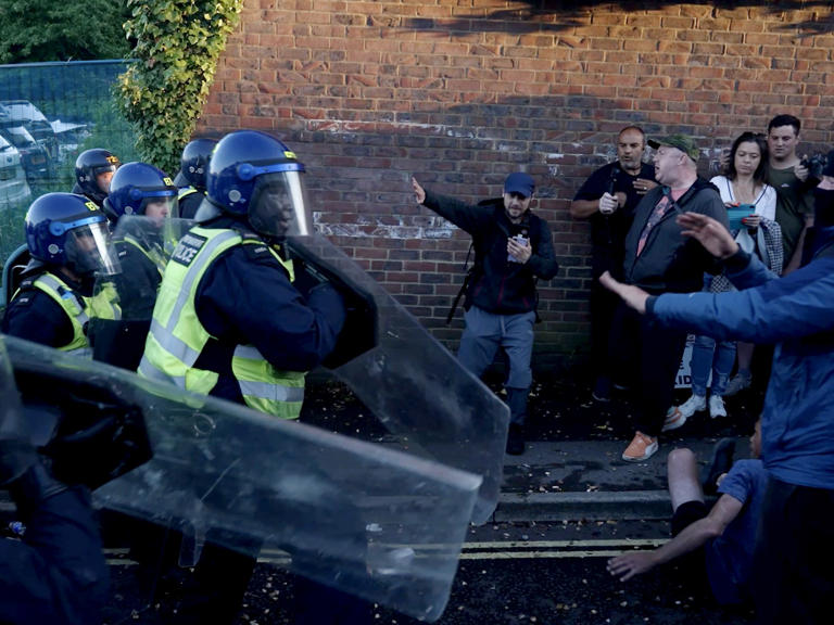 Two men jailed for violent disorder at mob protest following death of ...
