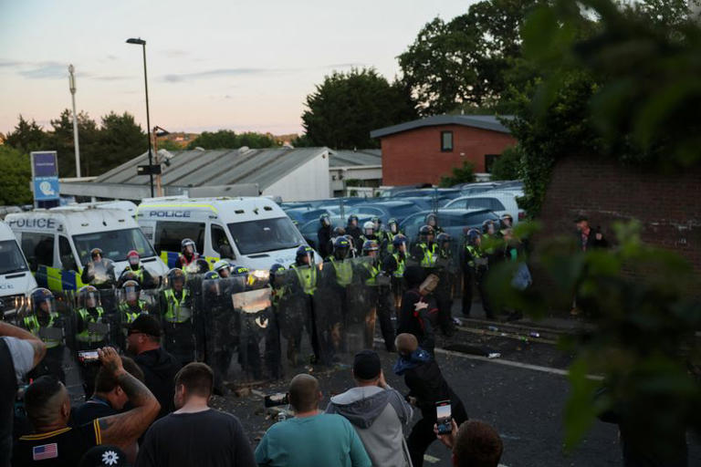british-pm-urges-calm-after-protests-over-handcuffed-student-s-death