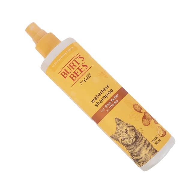 Burt's Bees for Cats Waterless Shampoo with apple scent, 10 oz bottle, shown with cat illustration and bee pattern