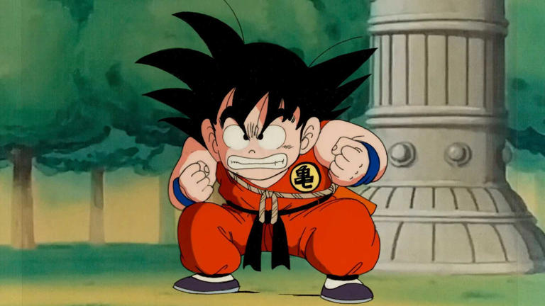 An angry kid Goku in Dragon Ball preparing for a fight