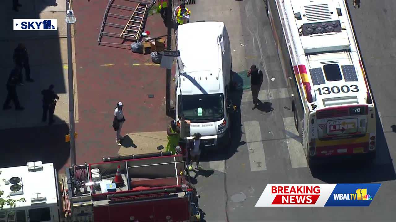 12 taken to hospital after MTA bus collides with work van