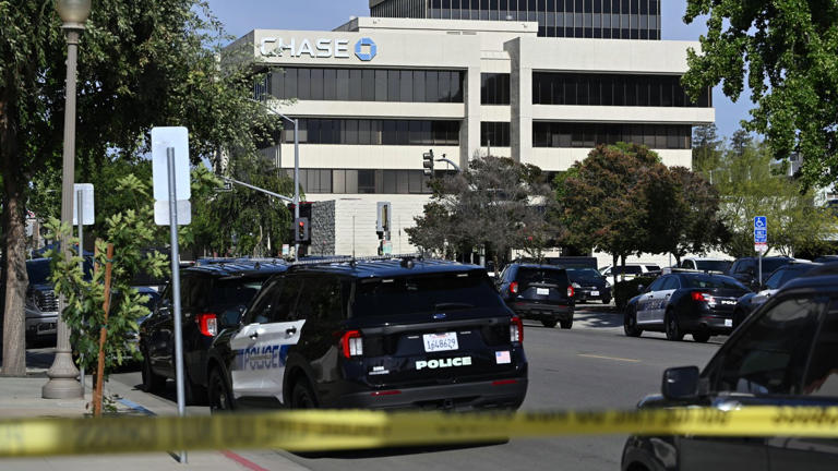 Police and FBI officers cordon off the scene in Bakersfield, California, on Tuesday. Pic: AP