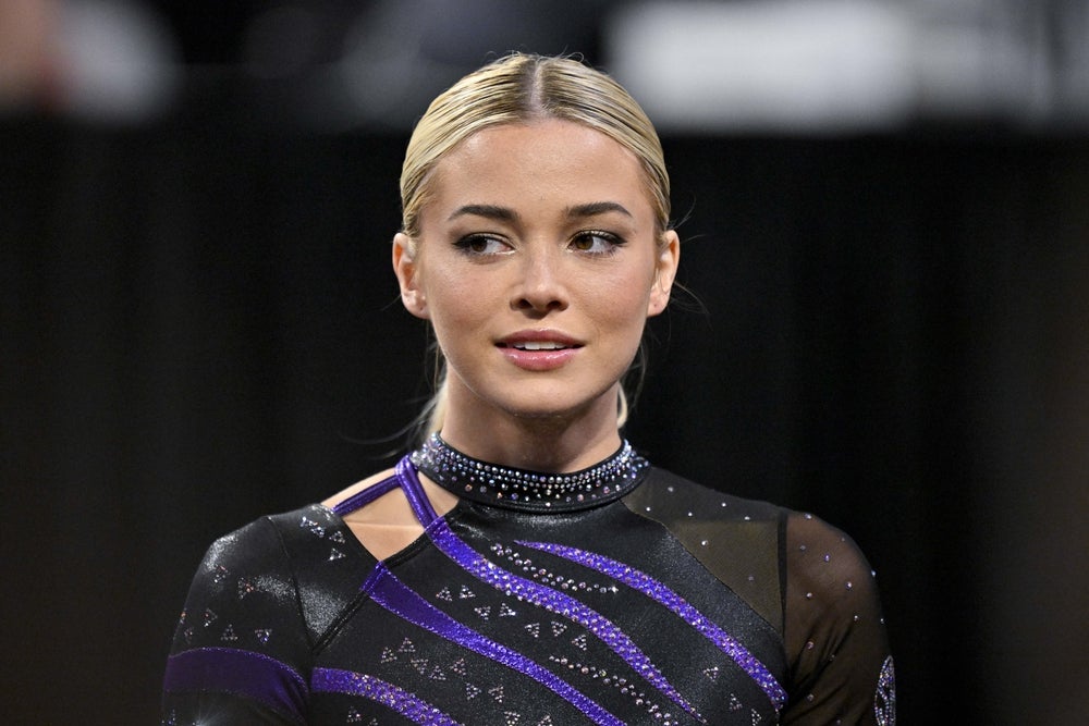 Apr 17, 2025; Fort Worth, TX, USA; LSU Tigers gymnast Olivia Dunne looks on during the 2025 Women's National Gymnastics Semifinal at Dickies Arena. Mandatory Credit: Jerome Miron-Imagn Images