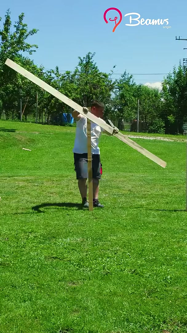 This unusual fence design uses simple wooden boards