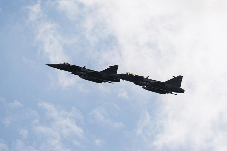 Swedish Air Force Saab Gripen fighter jets fly over Helsingborg, Sweden, on May 21 (AFP/Getty)