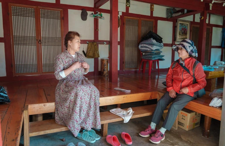 Son's photobook honors mother's 43-year island mail delivery career