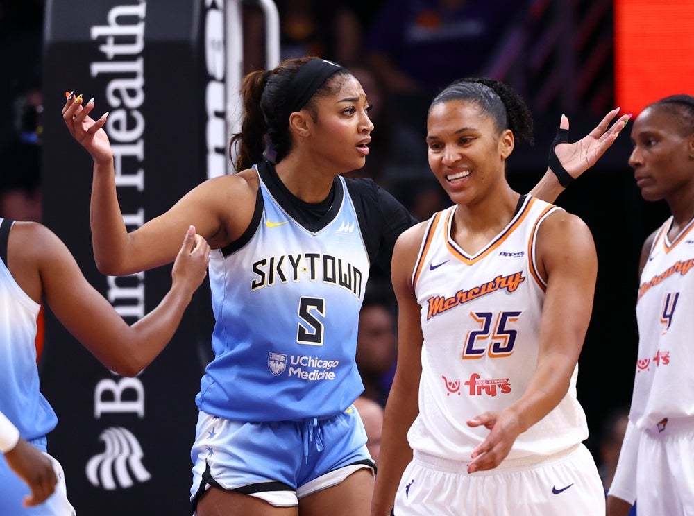 Aug 28, 2025; Phoenix, Arizona, USA; Chicago Sky forward Angel Reese (5) reacts after being called for a foul against Phoenix Mercury forward Alyssa Thomas (25) in the first half at Phx Arena. Mandatory Credit: Mark J. Rebilas-Imagn Images