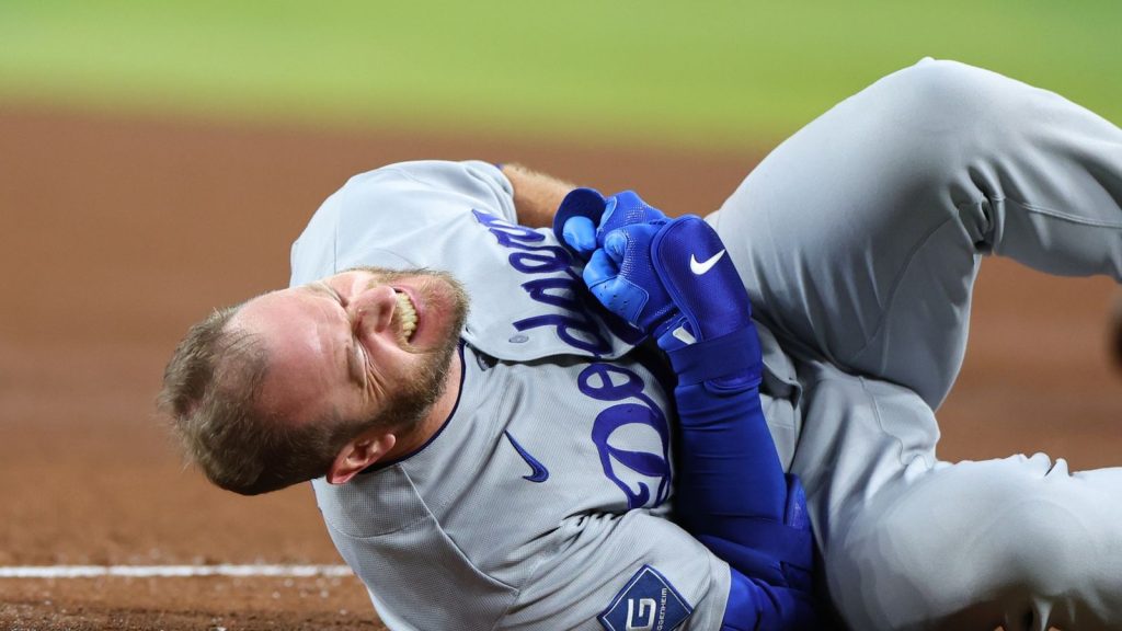 Muncy injury concern looms as Dodgers fall on Marte walk-off