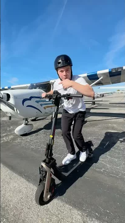 Racing an airplane on an electric scooter!