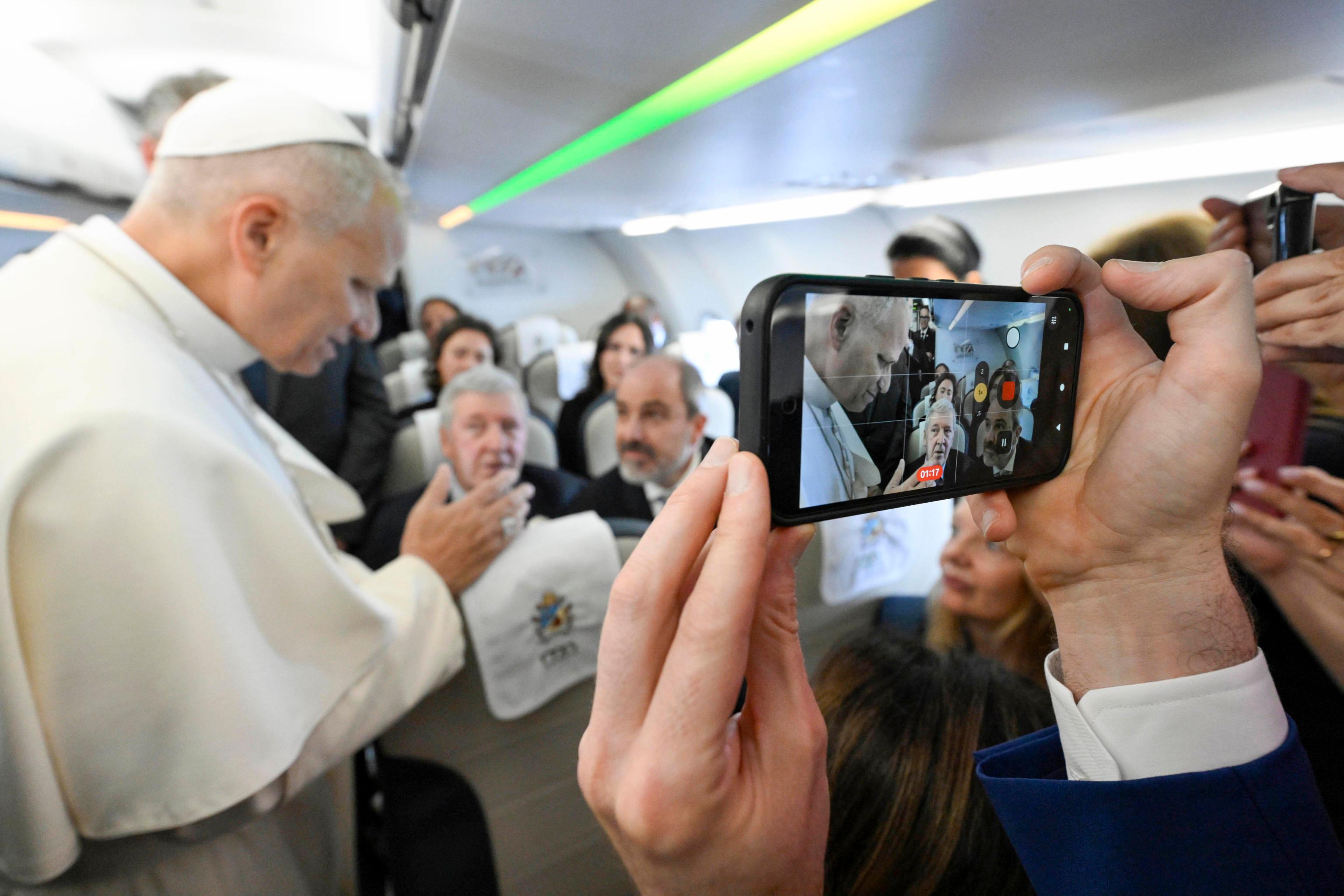 Pope Leo on the flight from Rome to Madrid during his apostolic journey to Spain, 6 June 2026. ANSA/VATICAN MEDIA + UFFICIO STAMPA, PRESS OFFICE, HANDOUT PHOTO, NO SALES, EDITORIAL USE ONLY + NPK