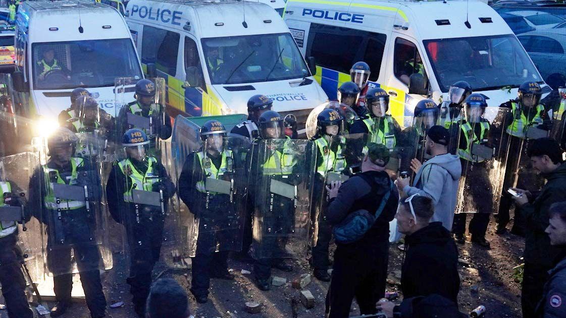 Six charged with violent disorder after Nowak protest