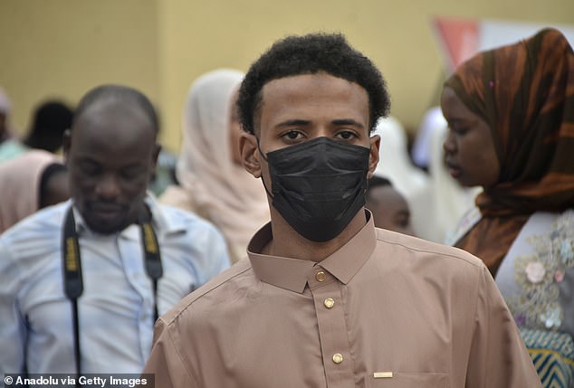 Amid an increase in Ebola cases, Muslim worshippers in Uganda headed to the National Mosque - some taking precautions with face masks