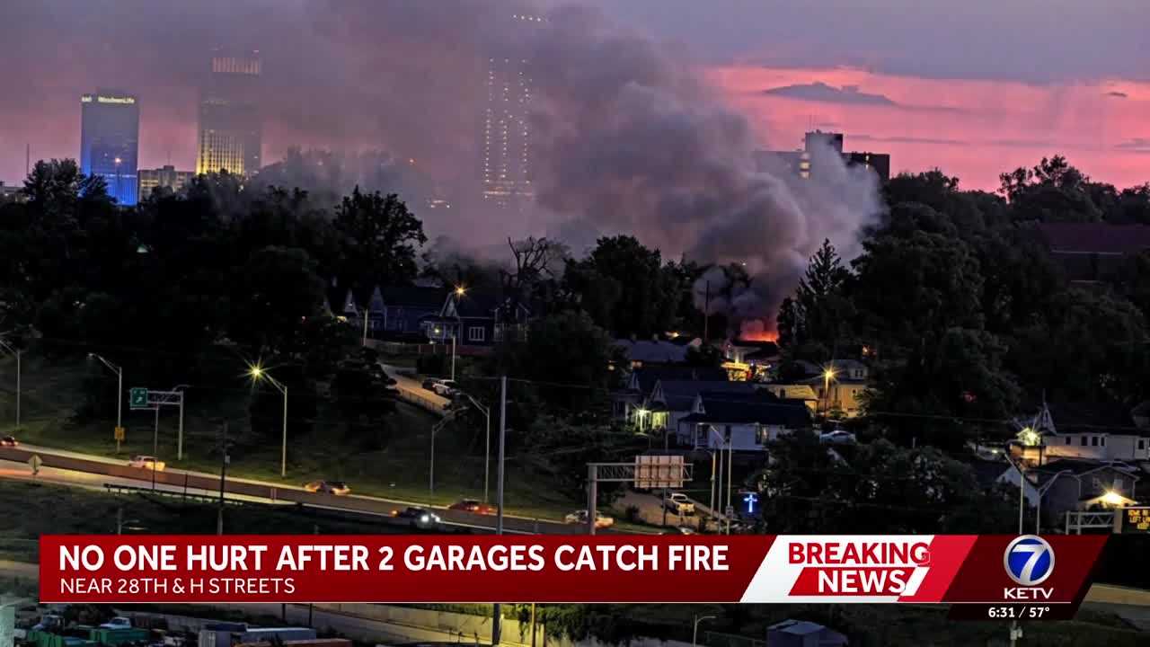 Crews battle large two-garage fire in South Omaha early Wednesday