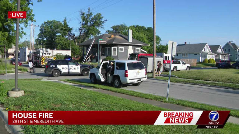 North Omaha house fire brings multiple crews to the scene