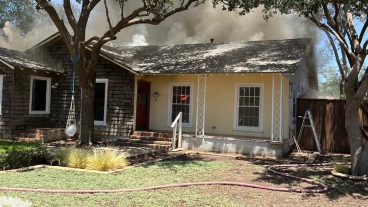 Two adults, two children displaced after house fire in Midland