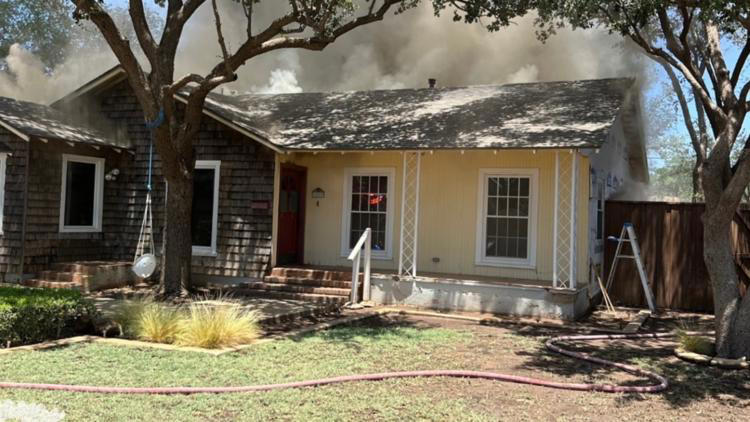 Two adults, two children displaced after house fire in Midland