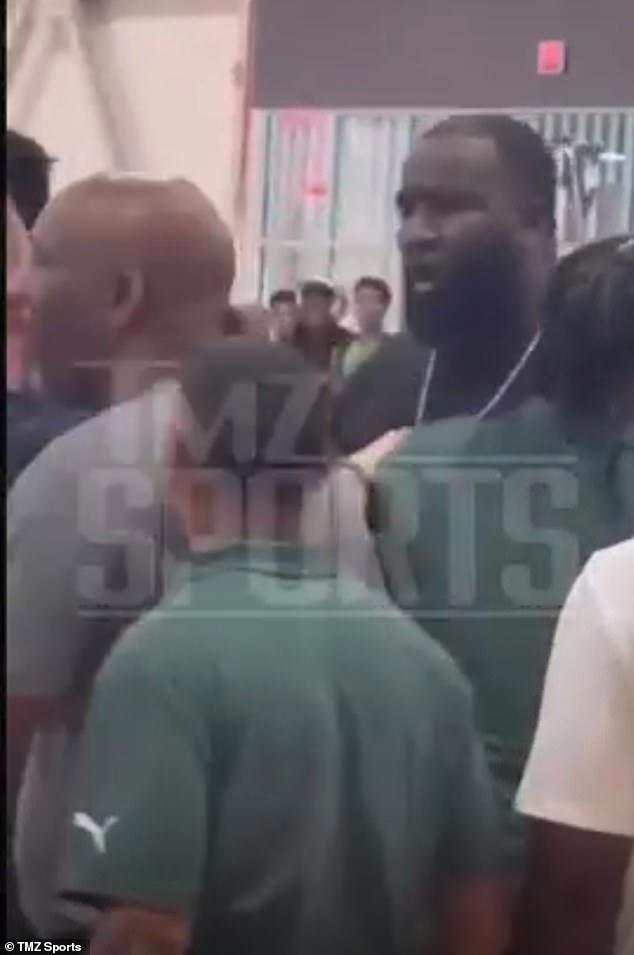 Ex-NBA star and ESPN analyst has to be held back during furious ...