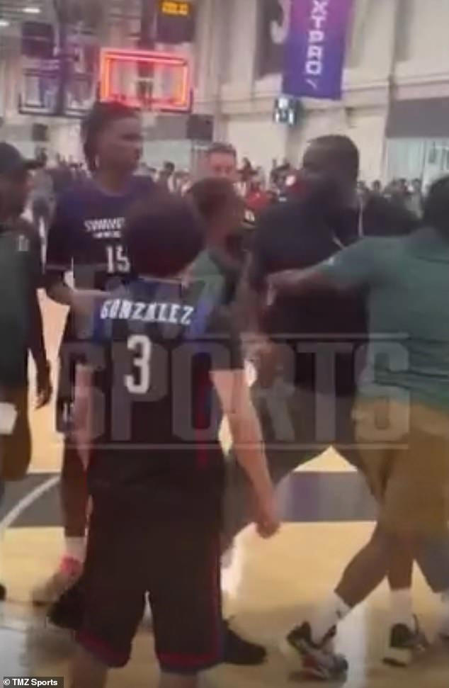 Ex-NBA star and ESPN analyst has to be held back during furious ...