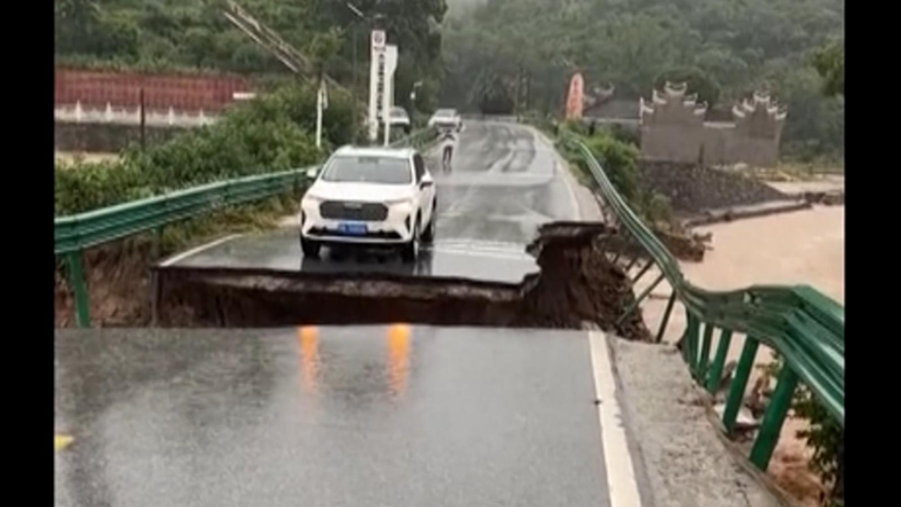 Car plunges into river after bridge collapse in China