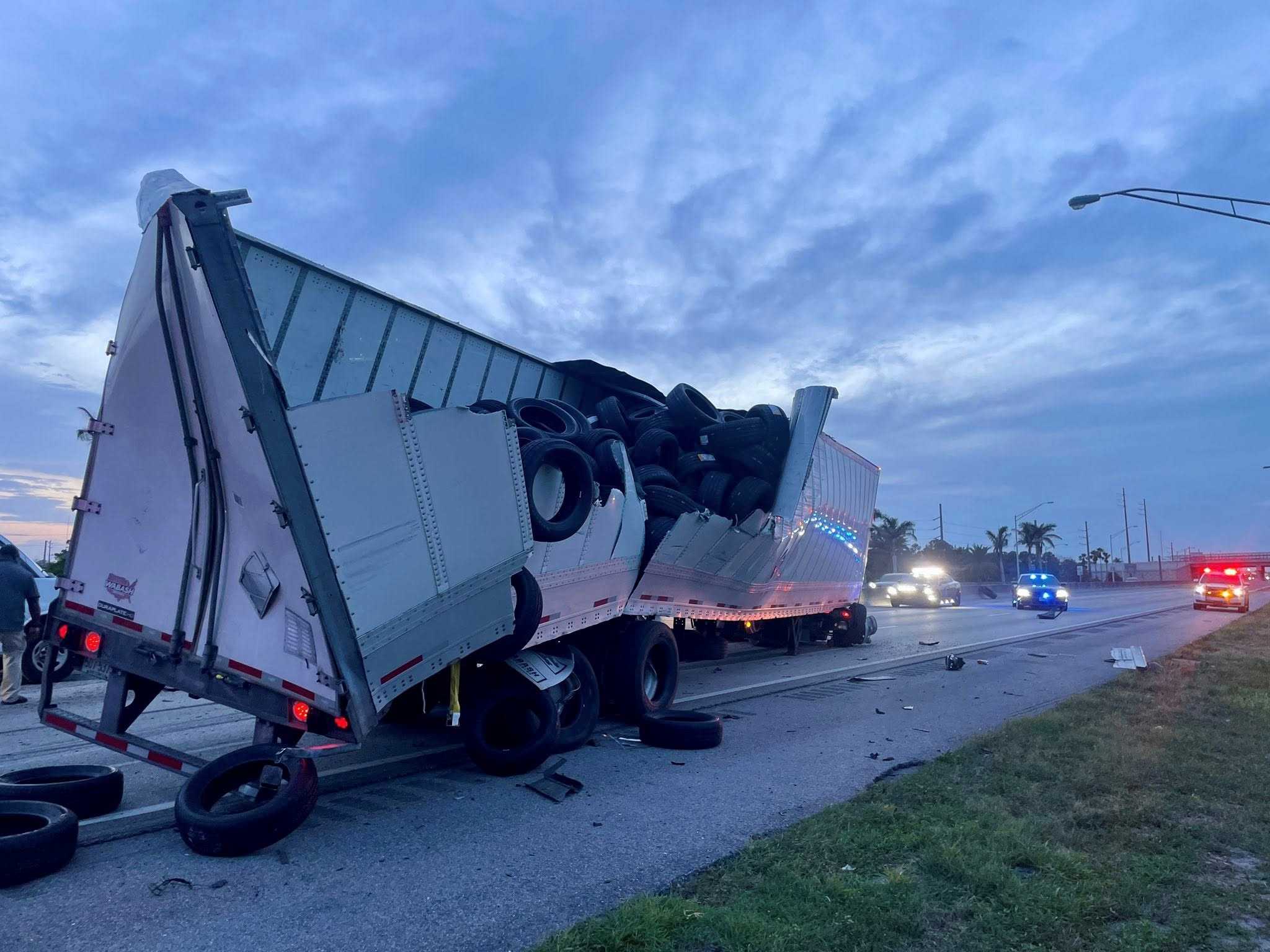 Turnpike lanes closed in Palm City after semi truck crashes into bridge