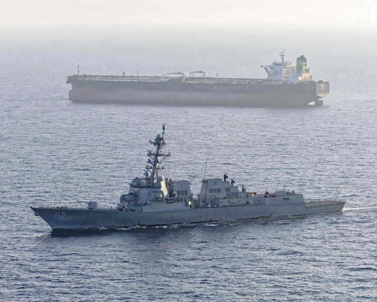 A U.S. Navy guided-missile destroyer intercepts the Iranian-flagged oil tanker M/V Stream as part of the maritime blockade of Iranian shipping.