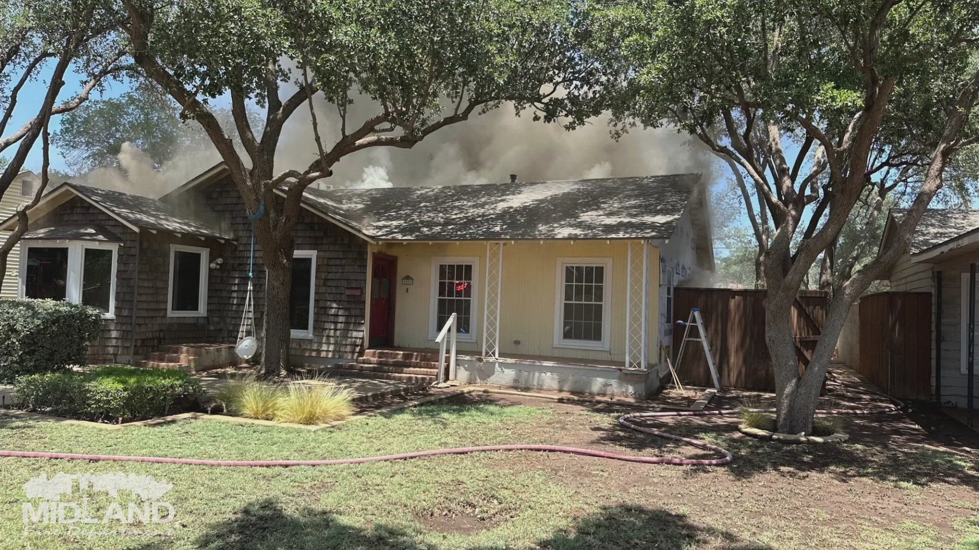 Two adults, two children displaced after house fire in Midland