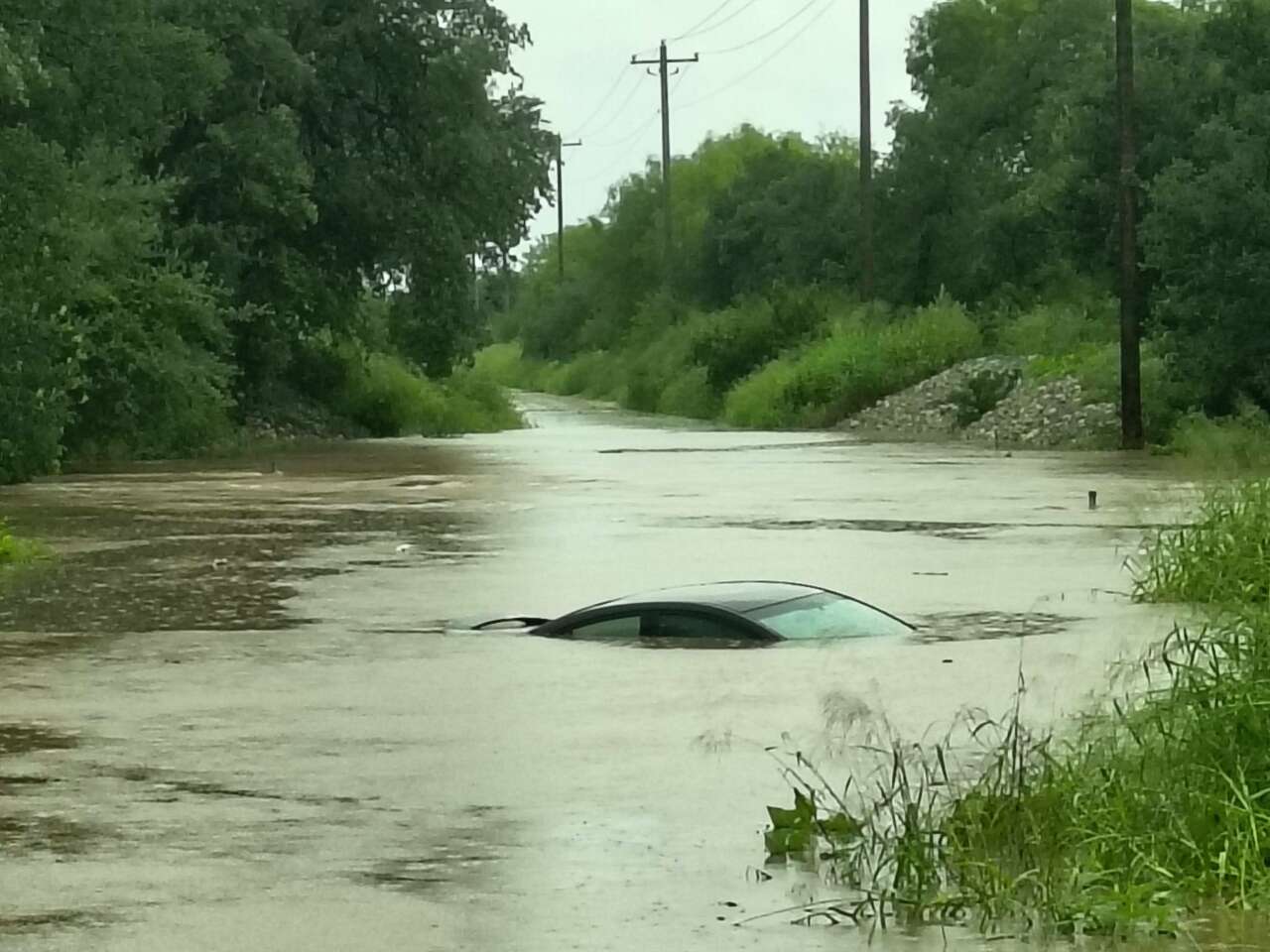 Flood waters, massive hail spotted amid severe weather in Texas