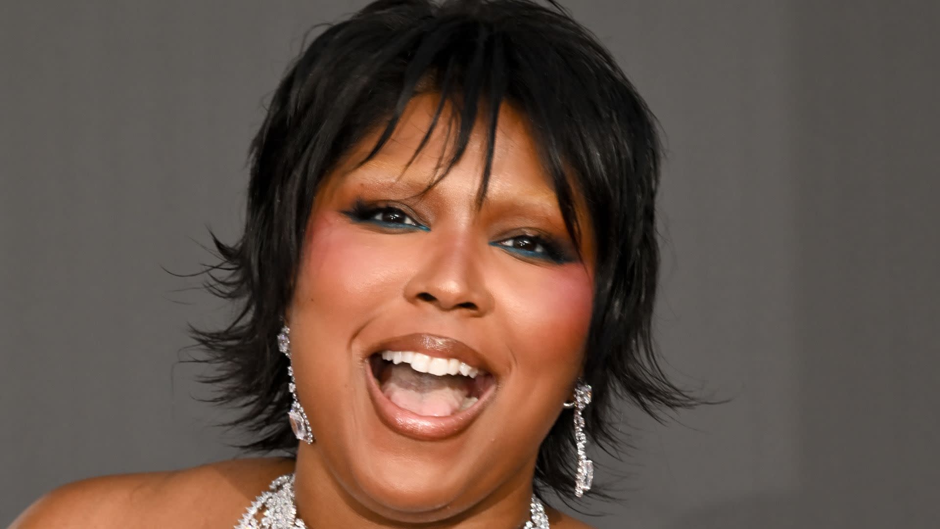 Lizzo plays a rib flute in Chili's disco-themed baby back ribs ad