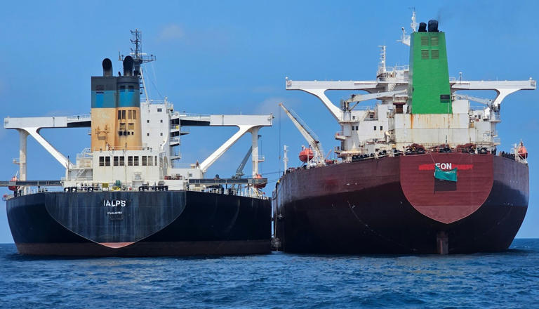 This handout photo from United Against Nuclear Iran shows two oil tankers making a ship-to-ship transfer of Iranian oil in the Eastern Outer Port Limits last July.