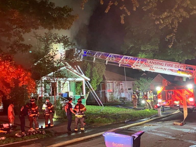 Firefighters battle fire at Lansing home early Thursday