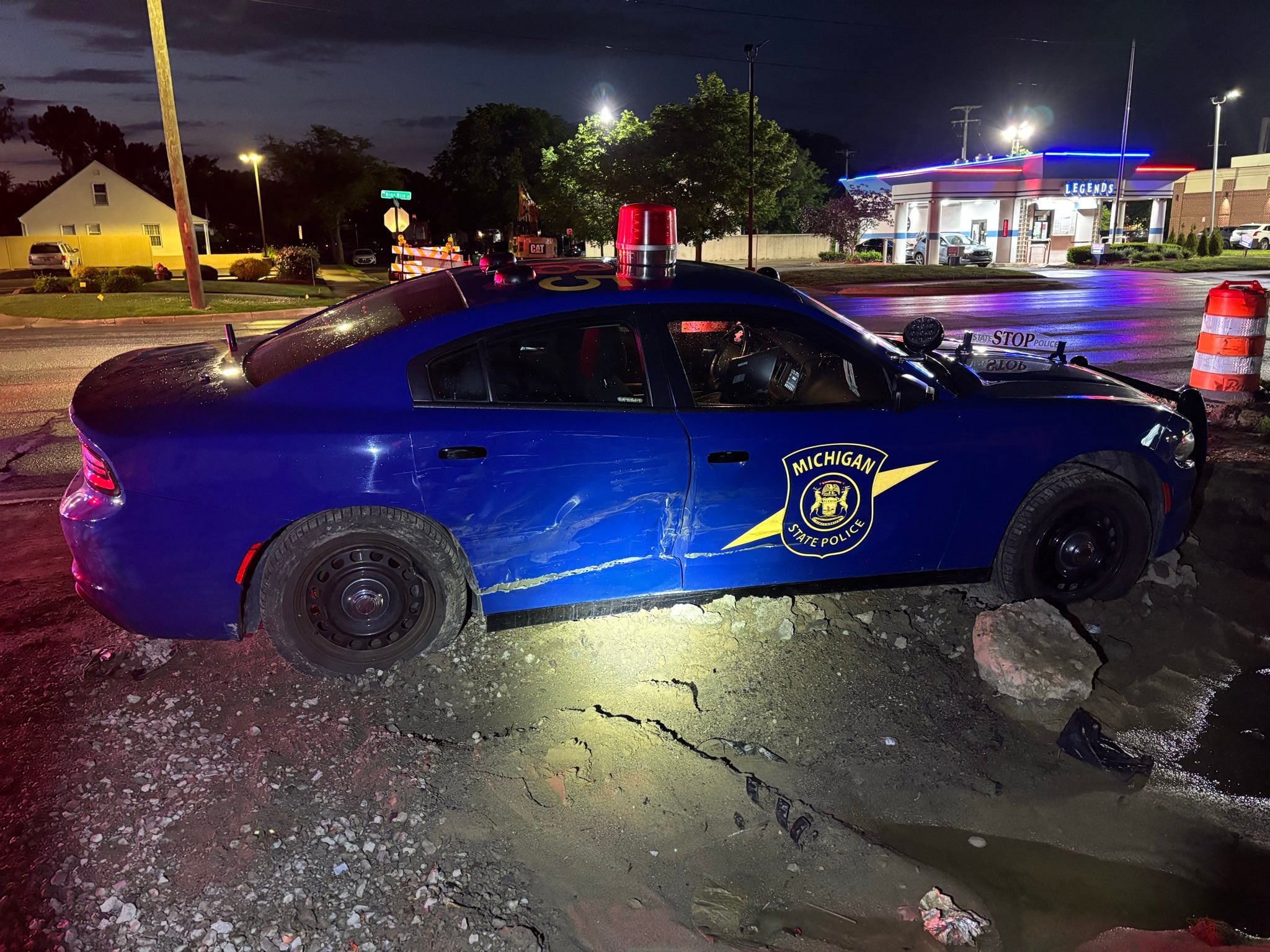 Woman arrested after crashing into Michigan State Police cruiser in Detroit