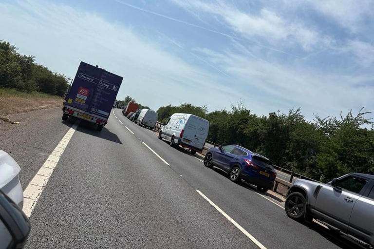 A12 shuts after car transporter catches fire near Witham
