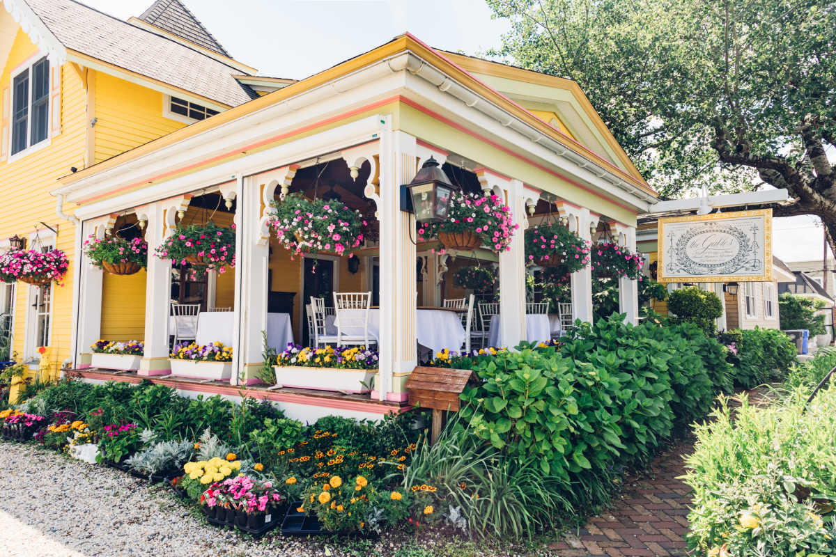 restaurant with patio dining and hanging baskets