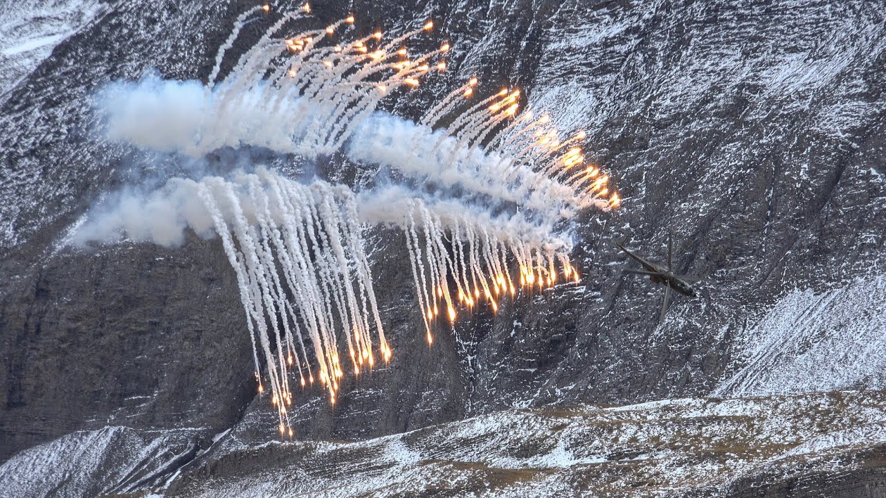 Watch these jets dump flares across the mountains - 