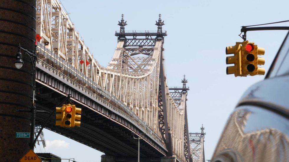 2 men killed in scooter-bicycle crash on the Queensboro Bridge