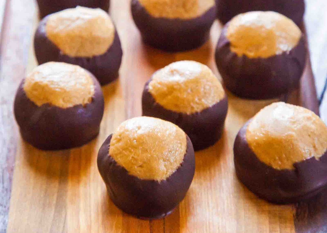 Buckeye candies on a wooden surface