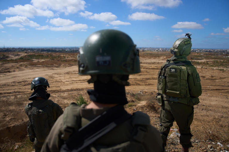 Israeli soldiers occupy a military position overlooking the ‘yellow line’ in the central Gaza Strip on 26 May. Photograph: Ariel Schalit/AP