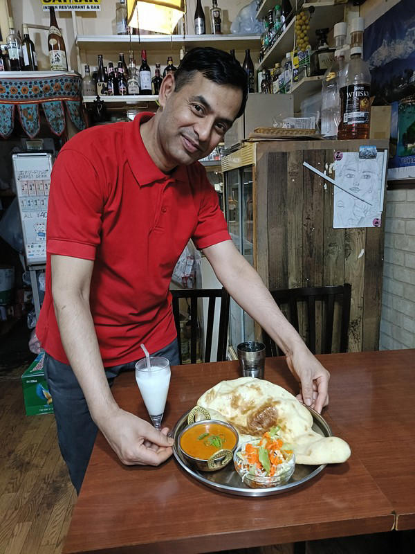 Adhikari is seen in his Indian curry restaurant Satkar in Tokyo, May 11, 2026. (Mainichi/Hidenobu Fukuhara)