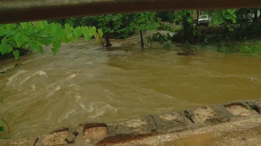 First responder recounts rescue after flood waters sweep woman off ...
