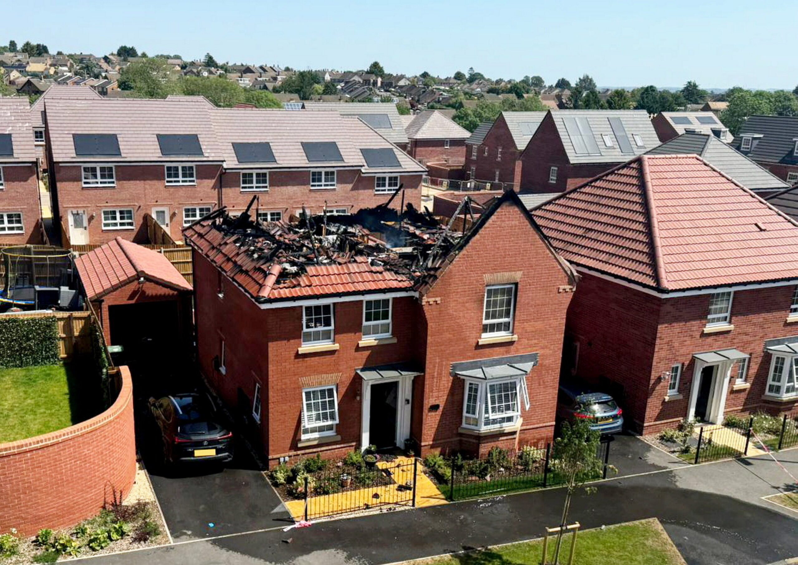 Moment solar panels burst into flames on £600k home with family inside