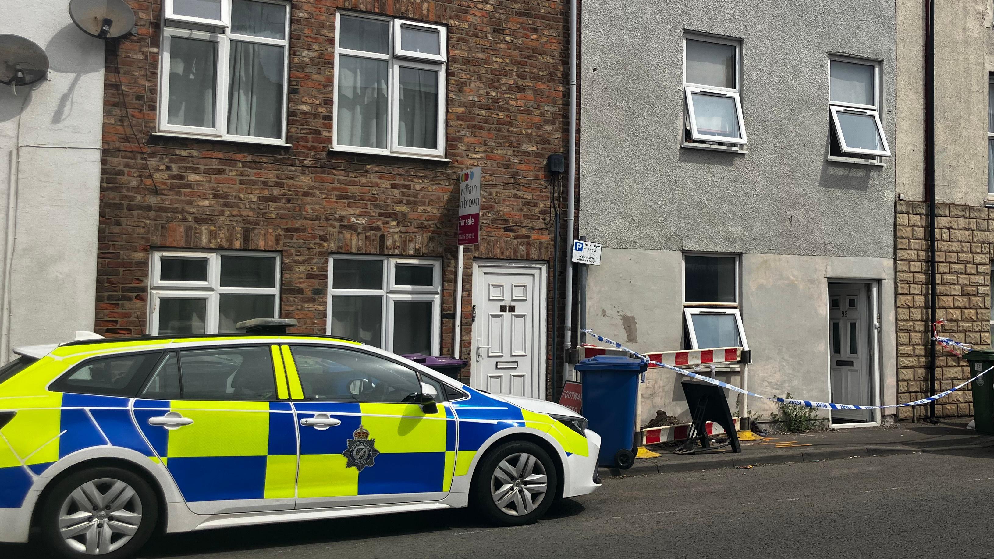 Three people taken to hospital after house fire
