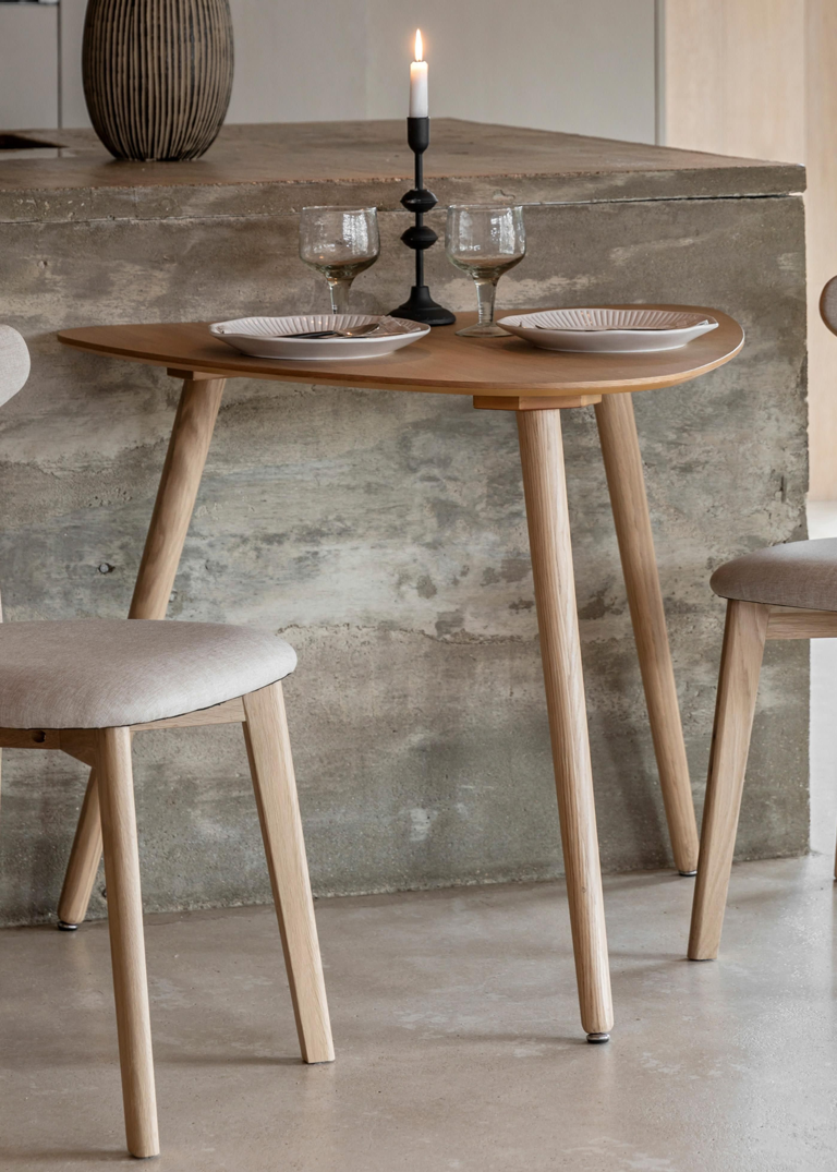 This half dining table is ideal for small kitchens — it's compact but ...