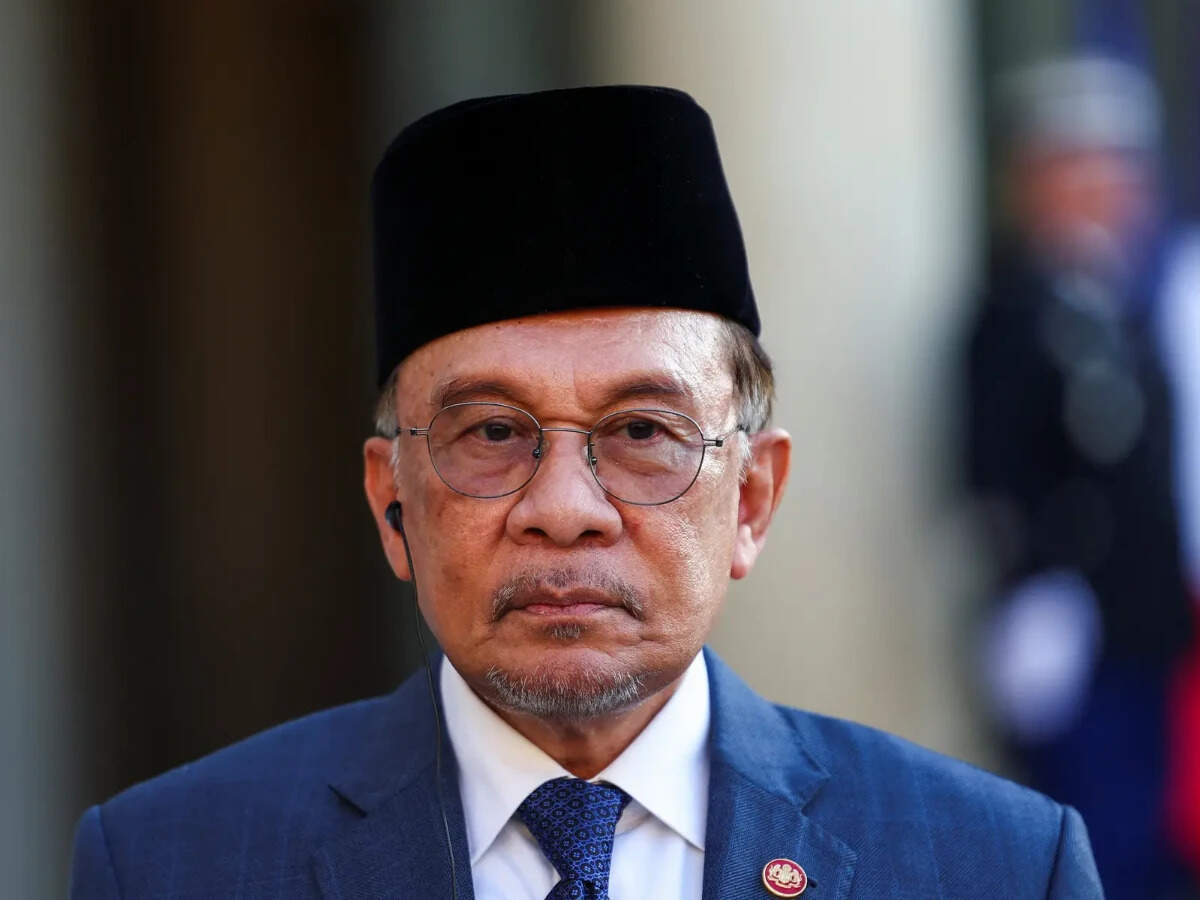 Malaysia PM Anwar under pressure amid growing defections from his party