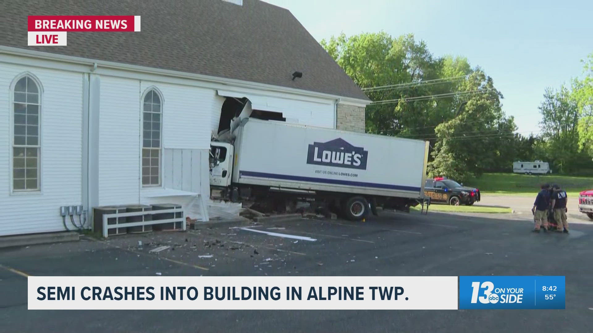 Box truck crashes into church in Alpine Township