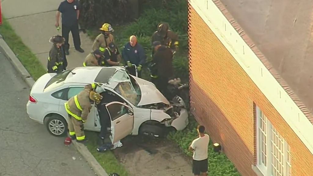 Driver, passenger extricated from vehicle after crashing into Detroit ...