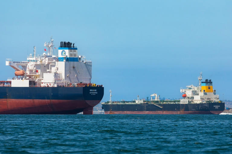 Oil declines lift stocks to fresh records