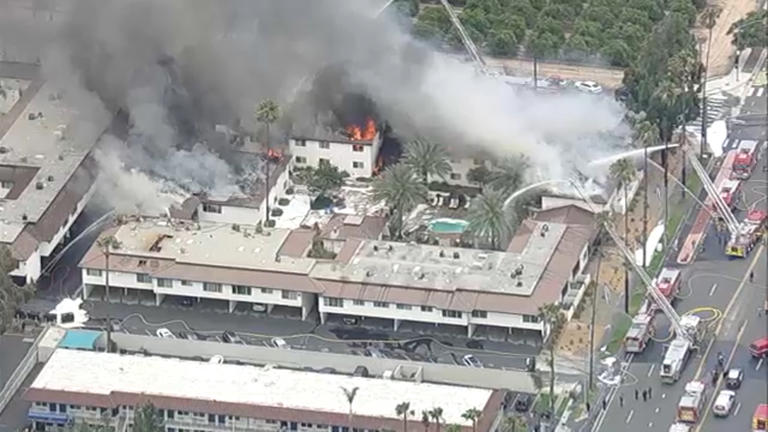 Riverside apartment complex fire displaces 150 people, cause appears to ...