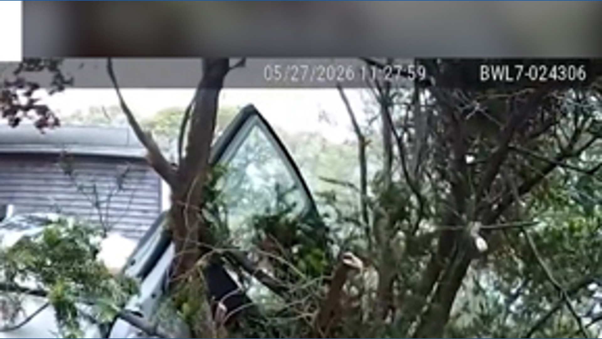 First responders rescue man trapped in car on steep hill