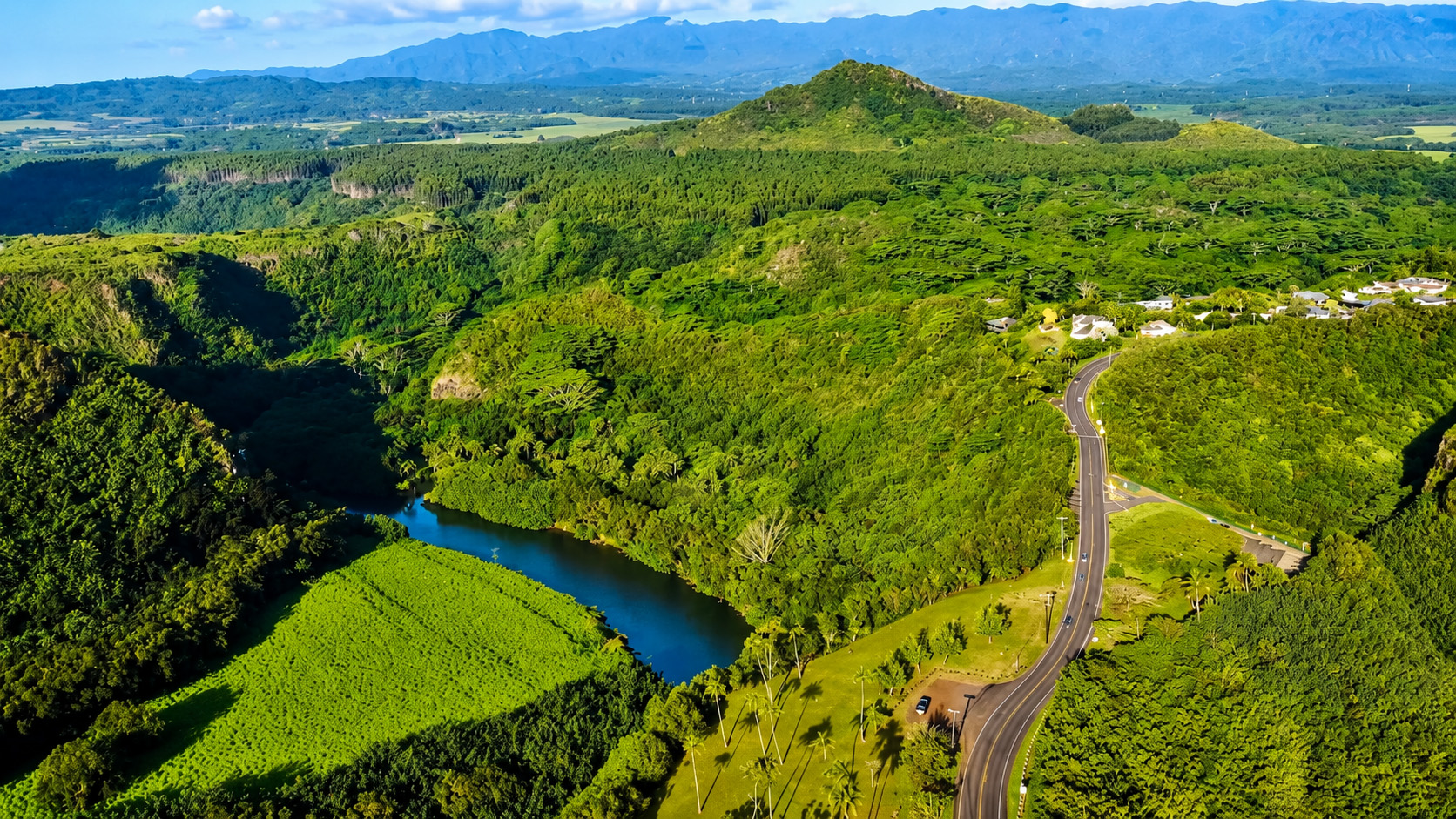 Kauai’s sacred river flowing through a lush Hawaiian valley