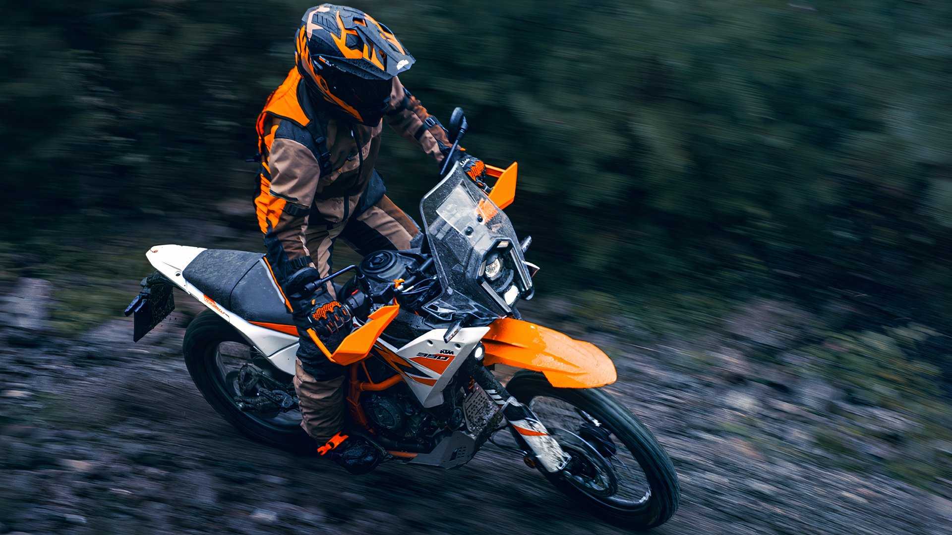 A rider carving through the wild on a 2026 KTM 390 Adventure R